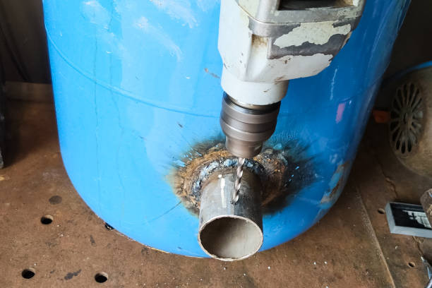 istock Making homemade smelting stove. Metal welding. 1255452288