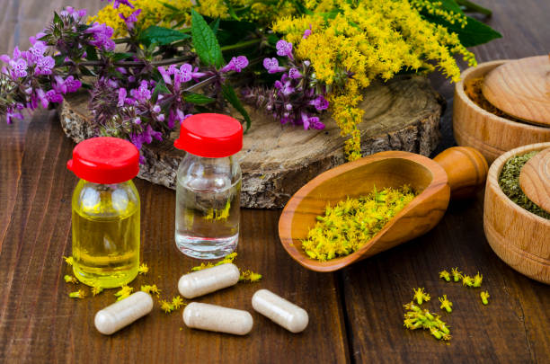 istock Pills and oil from medicinal plants. Photo 1255454049