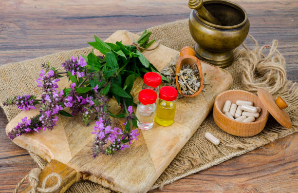 istock Pills and oil from medicinal plants. Photo 1255454316