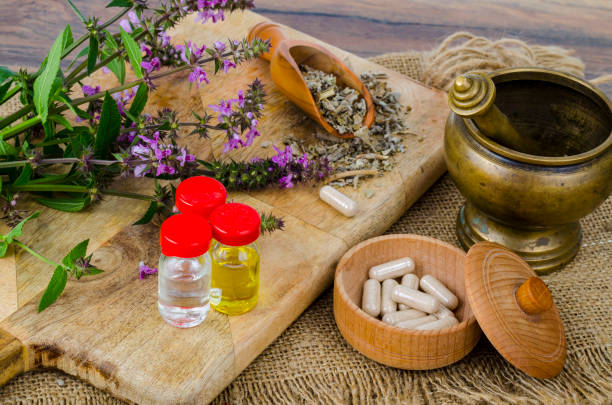 istock Pills and oil from medicinal plants. Photo 1255454325
