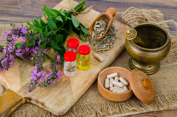 istock Pills and oil from medicinal plants. Photo 1255454355