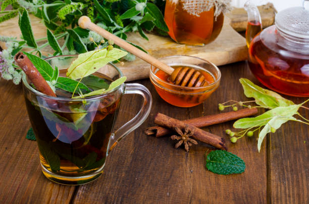 istock Herbal tea with mint, dried linden flowers 1255454415