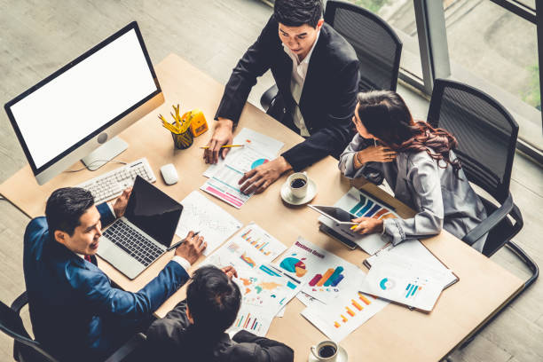 istock Business people group meeting shot from top view 1255456099