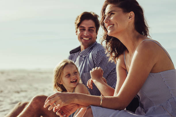 istock Family having enjoyable day on the beach 1255457040