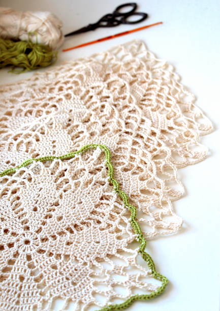 istock Beige pattern made of cotton and viscose yarn is crocheted. 1255460940