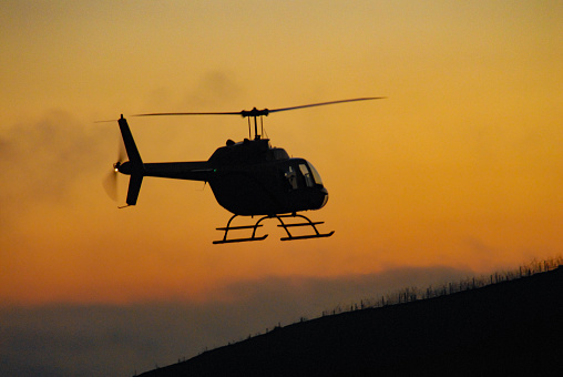 Twilight Helicopter silhouette landing