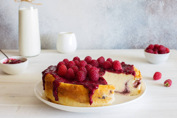 istock Homemade baked ricotta cheese cake with fresh raspberries 1255462705