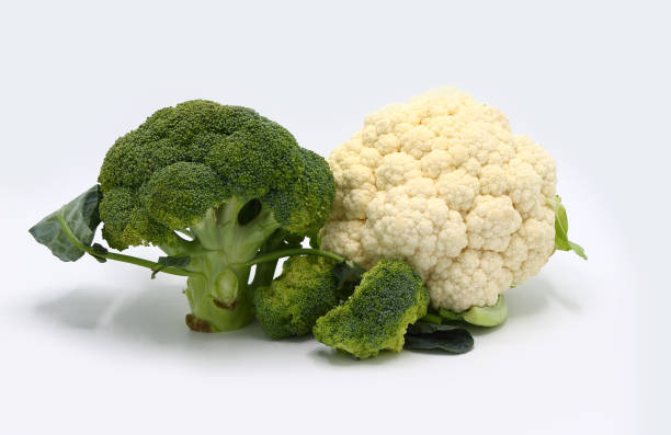 istock Raw broccoli and cauliflower on a light background. Natural product. 1255462875