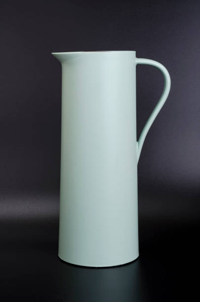 istock Color jug with handle for water. Photo 1255465038