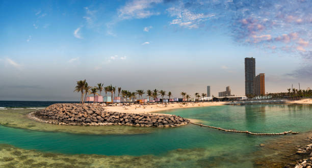 Beach area at Jeddah Corniche in western Saudi Arabia The Jeddah Corniche is the 30 km coastal resort area of the city of Jeddah. Located along the Red Sea, the corniche features a coastal road, recreation areas, pavilions and large-scale civic sculptures — as well as King Fahd's Fountain, the highest fountain in the world. jeddah stock pictures, royalty-free photos & images