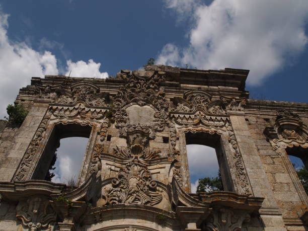 istock Old stone facade of abandoned palace 1255470335