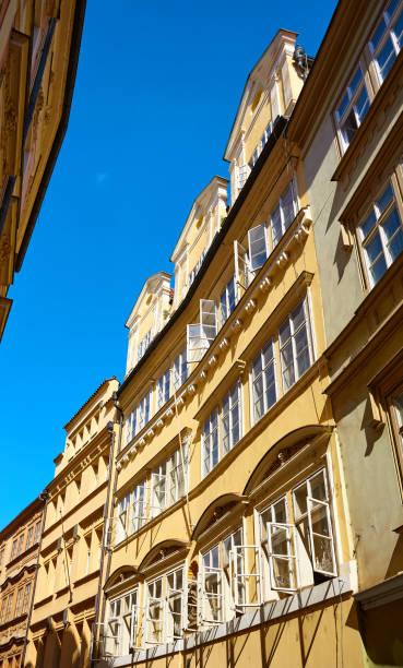istock Old building with open windows in Prague Old Town. 1255471558