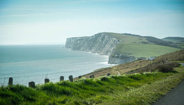 istock Driving along Freshwater Bay, Isle of Wight, England 1255481103