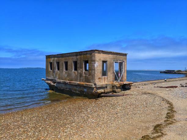 istock Abandoned building on the beach, Plymouth Massachusetts 1255481119