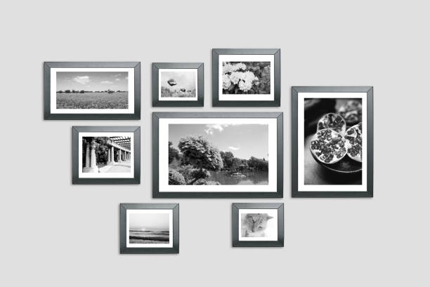 Photo frames on the wall, portfolio, photo lab Photo frames on the wall. Photography portfolio, photo lab concept light effect photos stock pictures, royalty-free photos & images