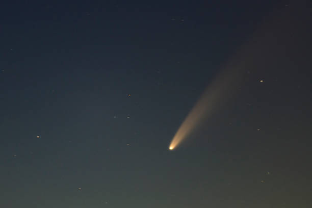 istock Comet Neowise in the dark night sky 1255481222