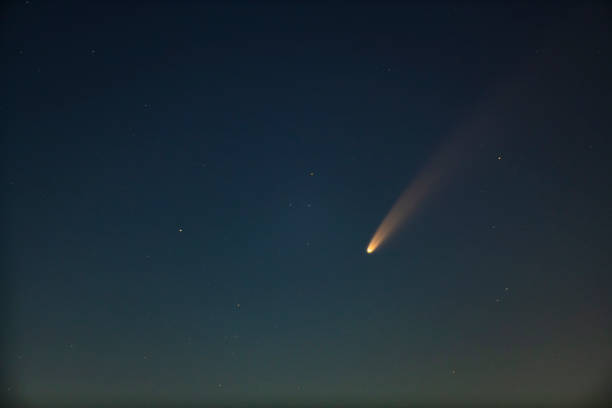 istock Comet Neowise in the dark night sky 1255481247