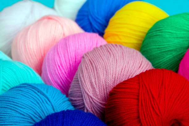 istock Bright multi-colored acrylic yarn. Colorful background. 1255481873