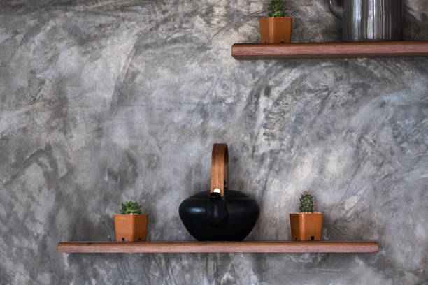 istock Concrete wall background texture grunge and grey surface with shelves and accessories, empty space for add text or image. Loft style. 1255485218