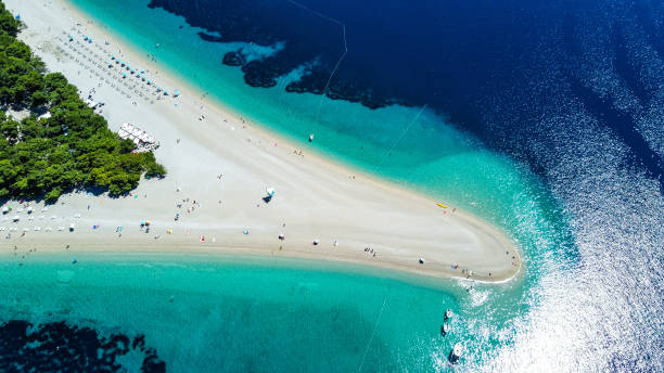 Magnificent Zlatni Rat from the sky Breathtaking moving beach with drone perspective brac island stock pictures, royalty-free photos & images