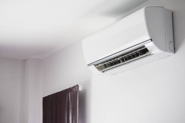 istock Air conditioner on white wall room interior background 1255491000
