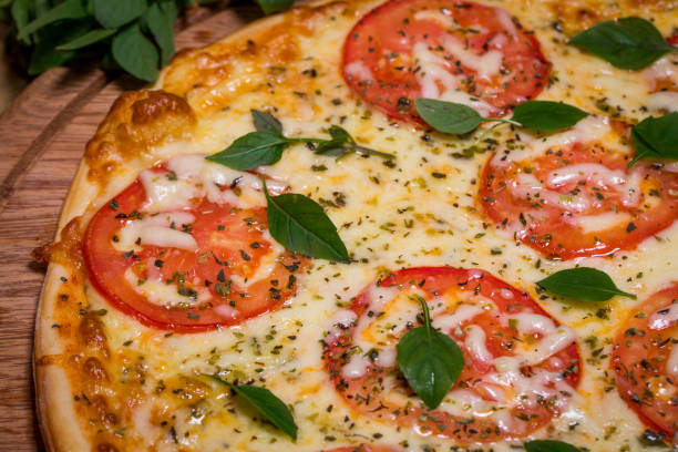 margherita pizza on wooden background- close up. - cocktail sauce imagens e fotografias de stock