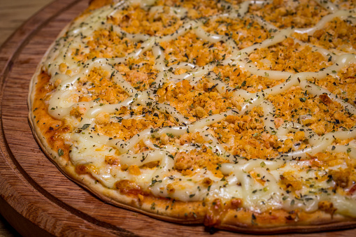 Chicken pizza with catupiry cheese, in Brazil it is called pizza de frango com catupiry.