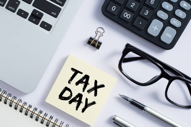 istock Tax Day Concept On Sticky Note 1255508219