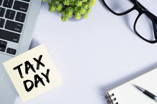 istock Tax Day Concept On Sticky Note 1255508233