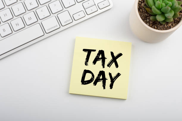 istock Tax Day Concept On Sticky Note 1255508234