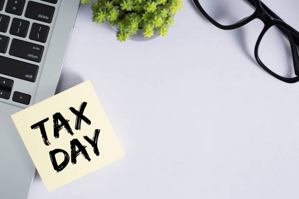 istock Tax Day Concept On Sticky Note 1255508237