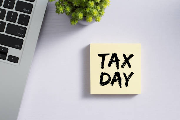 istock Tax Day Concept On Sticky Note 1255508240