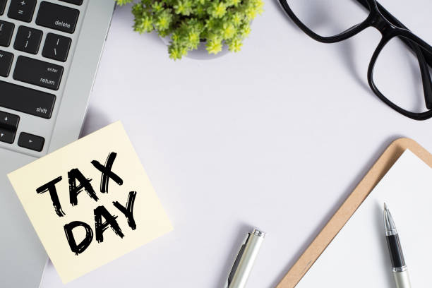 istock Tax Day Concept On Sticky Note 1255508241