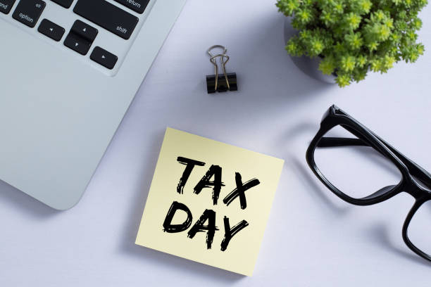 istock Tax Day Concept On Sticky Note 1255508243