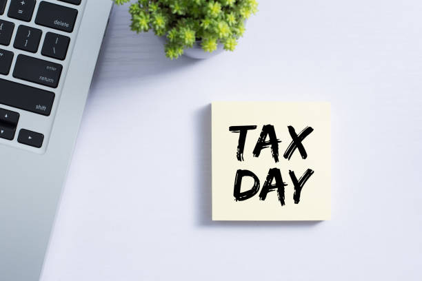 付箋の税の日の概念 - calendar tax april day ストックフォトと画像