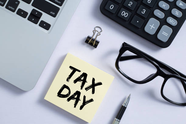 istock Tax Day Concept On Sticky Note 1255508246