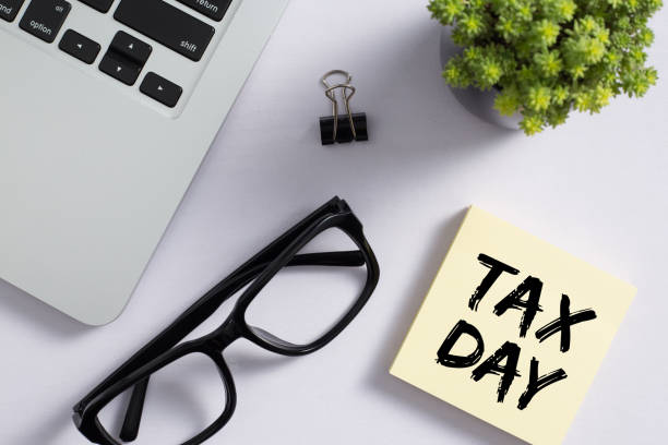 istock Tax Day Concept On Sticky Note 1255508247