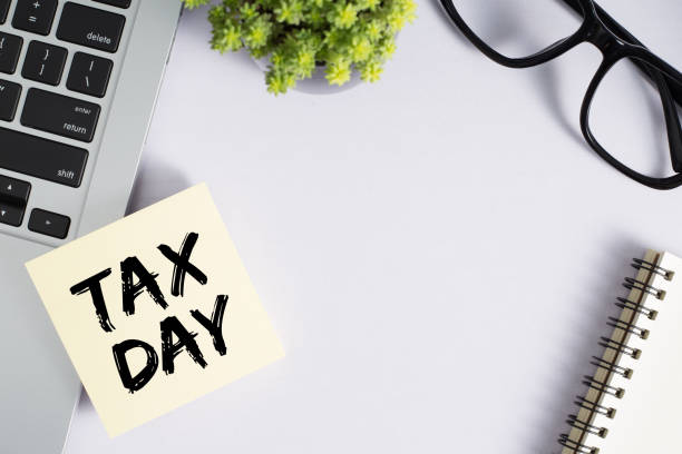 istock Tax Day Concept On Sticky Note 1255508248