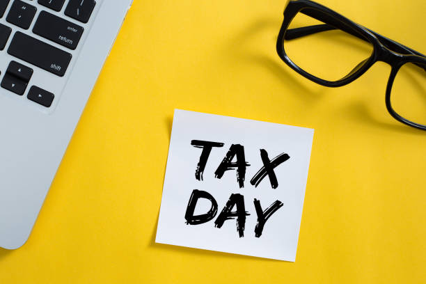 istock Tax Day Concept On Sticky Note 1255508250