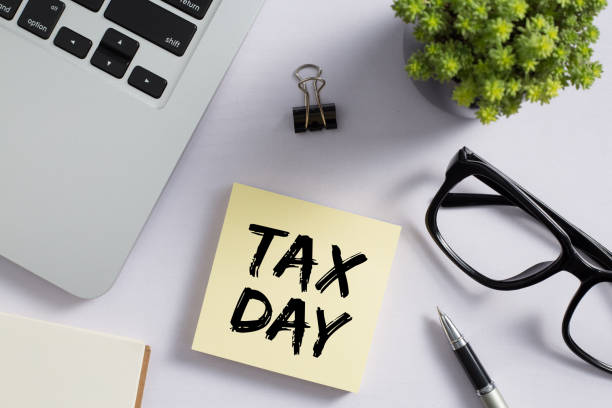 istock Tax Day Concept On Sticky Note 1255508253