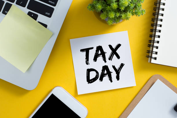 istock Tax Day Concept On Sticky Note 1255508254
