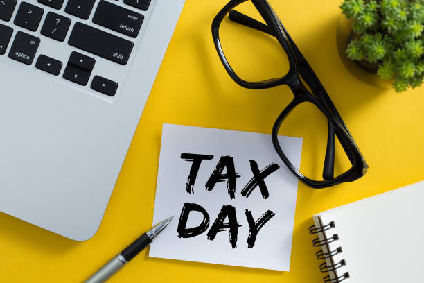 istock Tax Day Concept On Sticky Note 1255508255