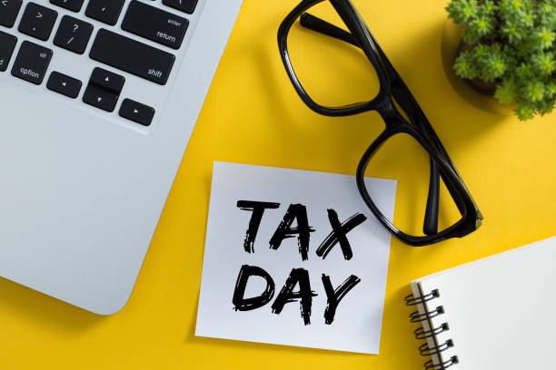 istock Tax Day Concept On Sticky Note 1255508256