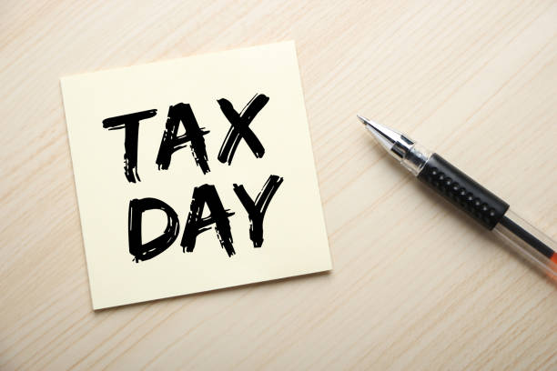 istock Tax Day Concept On Sticky Note 1255508257