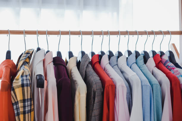 istock Row of clothes hanging on the rack. 1255521299