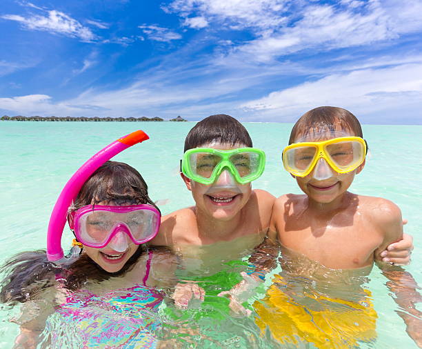 istock Kids in the ocean 125552323