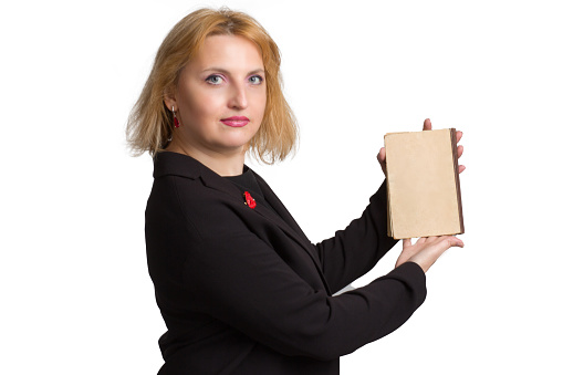 adult woman business office, in a business suit, overweight, holding a book, copy space