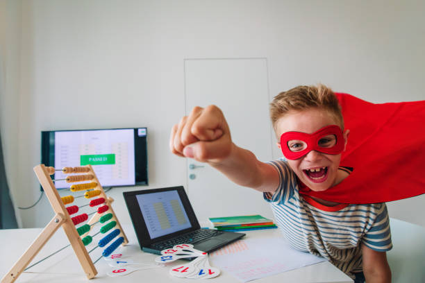 istock happy kid passed exam online, remote learning success concept 1255528656