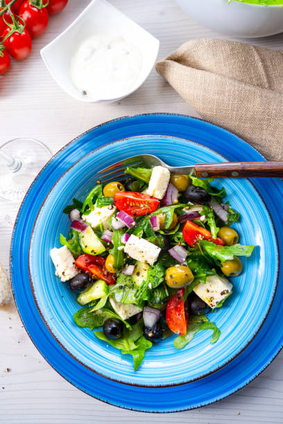 istock Rustic Greek salad with sheep's cheese 1255530369