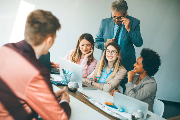 istock Group of multiethnic business people working on new project 1255535080